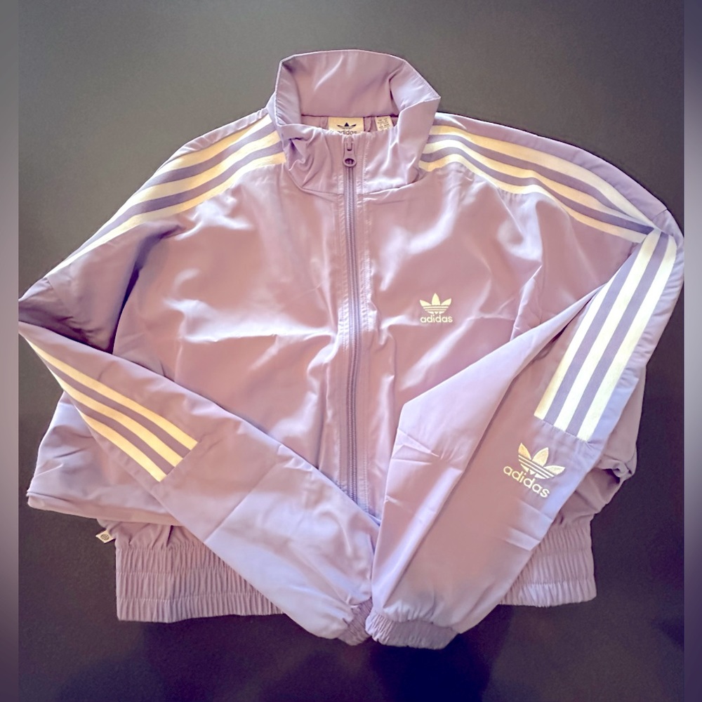 Brand new with tags, fall wind jacket, girls ADIDAS. Lilac color.